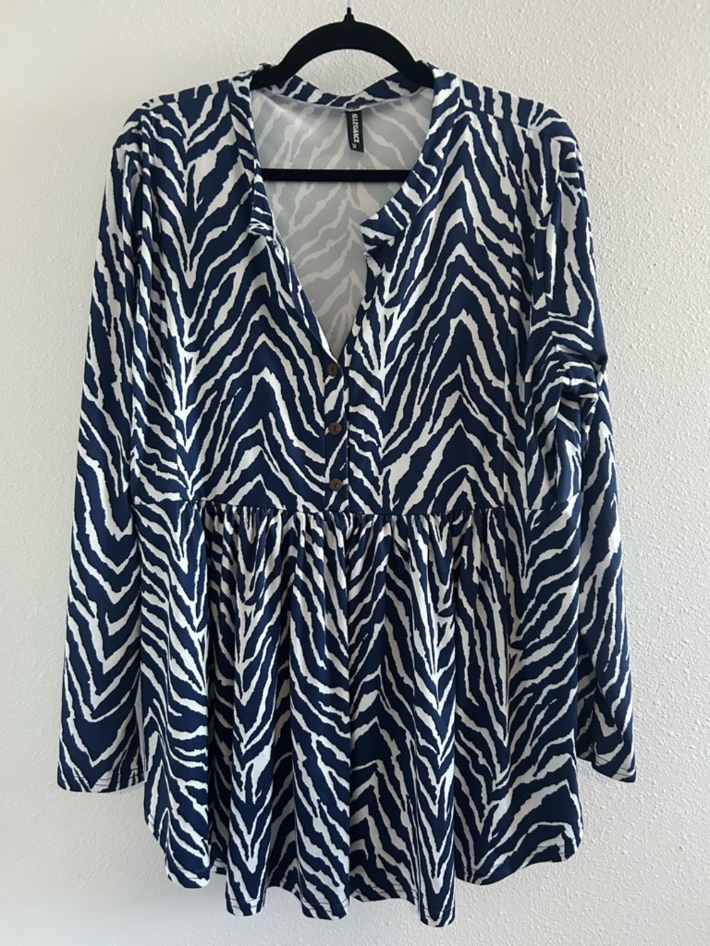 Allegrace Navy & White Zebra-Print Peplum Tunic Top